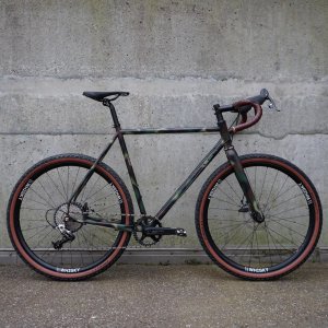 Modified Surly Midnight Special Bike. Its frame features an army pattern paint job.