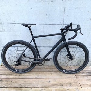 All black Open UP Raw Gravel/Allroad Cycle with DT Swiss GRC 1400 Wheels and Campagnolo Group